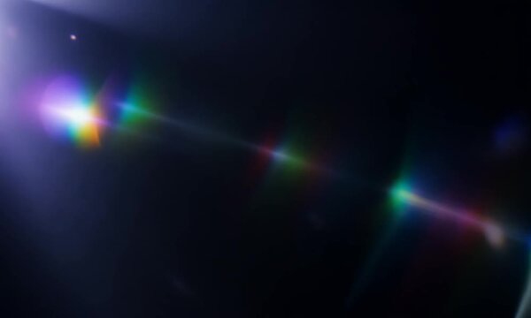 Light leaks footage on black background. Lens flare leak burst overlays. Natural lighting prism effect. 4K hyperrealistic video