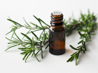 Rosemary essential Oil on white background surrounded by rosemary sprigs