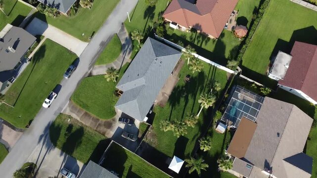 Drone shot flying over Florida neighborhood in the morning