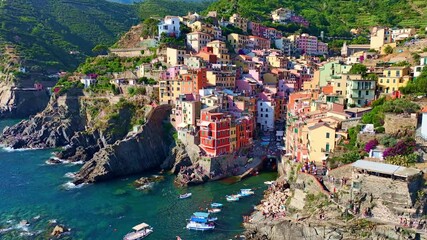 aerial video of Cinque terra in Italy, Riomaggiore town in Cinque terra on Italian riviera, vacation in Liguria, Italy, holiday in Italy