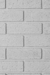 Painted grey indoor brick wall background.  Modern indoor interior design concept.