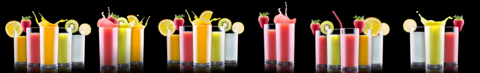 Delicious Fruit Smoothies in glass with splash isolated on a black background