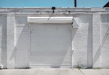 white wall with warehouse gate shutter