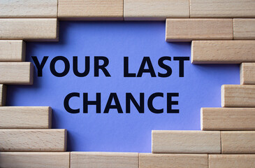 Your last Chance symbol. Concept words Your last Chance on wooden blocks. Beautiful purple background. Business and Your last Chance concept. Copy space.
