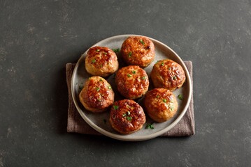 Roasted cutlets from beef and pork meat