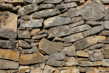An old wall built of broken stones