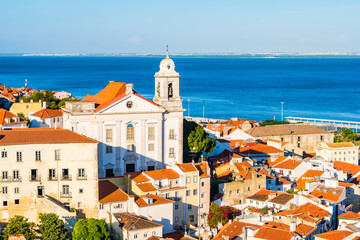 View of old cathedral and skyline of Alfama district, the oldest neighborhood of Lisbon in Portugal