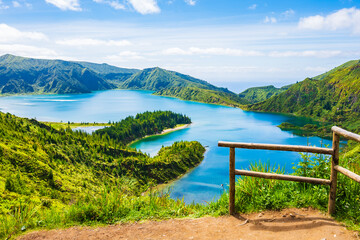 View of Lagoa do Fogo crater lake in green mountain landscape during summer from famous viewpoint, Sao Miguel island, Azores, Portugal © pkazmierczak