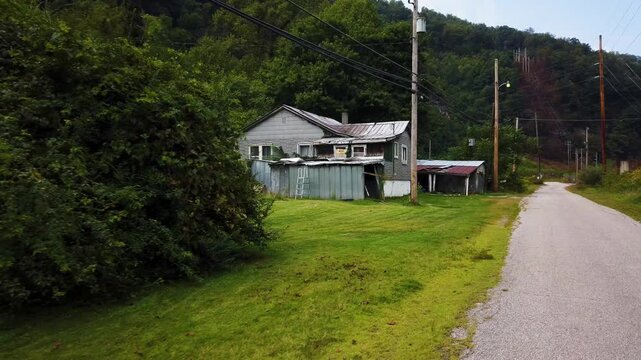Houses and streets in the abandoned coal mining town with a railroad through the middle of it in southern West Virginia.