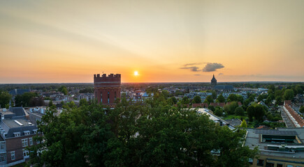 water tower at sunset