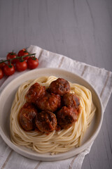 food, meatball, photography, spaghetti, meat, plate, pasta, meal, dinner, beef, tomato, sauce, lunch, dish, cooked, table, ball, color image