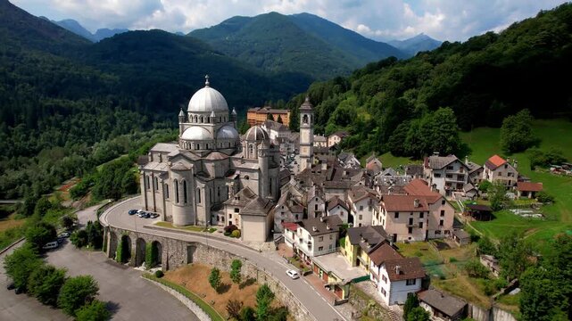 Sanctuary of Madonna del Sangue, Sanctuary of Re - scenic village in Piedmont, Italy . famous places of worship. aerial drone 4k hd video
