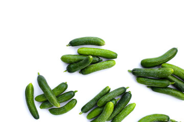 Mini cucumbers on white background.