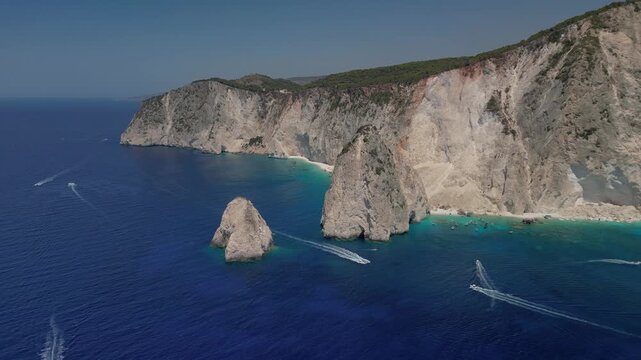 The drone aerial footage of Mizithres beach, Zakynthos Island, Greece. The two conical huge rocks, that bounce from the crystal blue waters in Keri, are called the Small and Big Mitzithra.