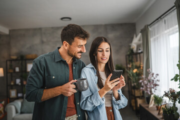Portrait of girlfriend show mobile phone screen to her boyfriend