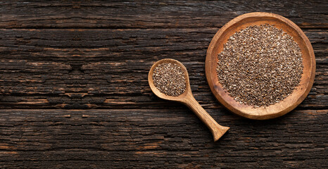Organic chia seeds in the bowl and spoon - Salvia hispanica