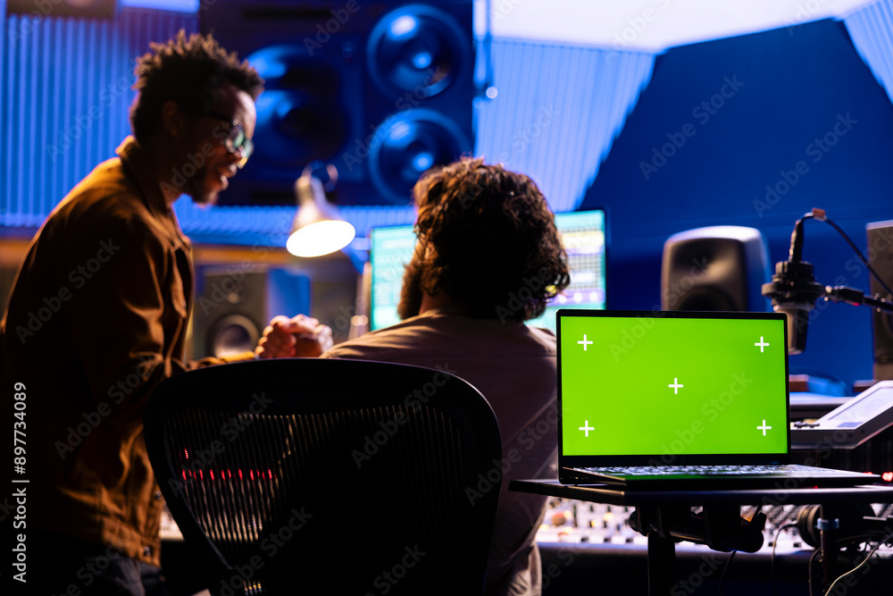 Poster musician and sound designer working on a new hit with isolated display, editing and adjusting volume