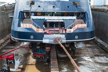 Ship in dry dock in a port for repairs