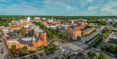 Aerial view of Fayetteville North Carolina downtown business district, main street in Cumberland county First Baptist Church. government buildings