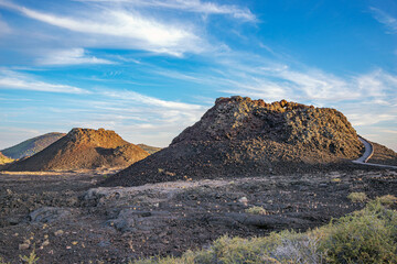 Scenic View Of Volcanic Landscape Under Blue Sky