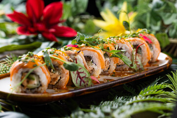 Elegant Sushi Rolls with Floral Garnish, Vibrant Sushi Platter with Edible Flowers, Artistic Presentation of Sushi and Flowers, Gourmet Sushi Dish with Decorative Touch