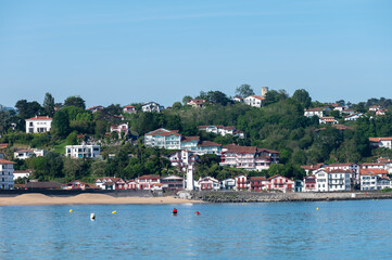 Fototapeta premium White houses and villas of Cibourne on Basque coast, famous resort, known for beautiful architecture, nature and cuisine, South of France, Basque Country