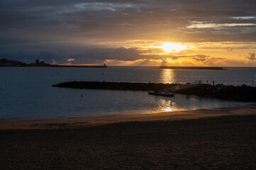 Ciboure and Saint Jean de Luz bay and sandy beach on Basque coast on sunset, famous resorts, known for beautiful architecture, nature and cuisine, South of France, Basque Country