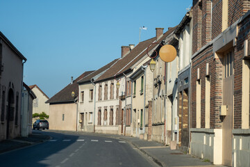 Driving in Champagne wine making region in Champagne, France. Streets, houses, road signes and places of destinations in summer