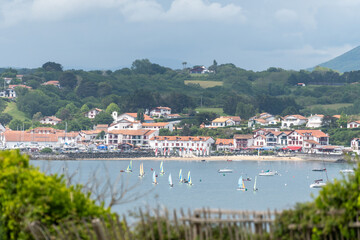 Obraz premium Ciboure and Fort of Socoa fishing ports on Basque coast, yachts training, known for beautiful architecture, sandy beaches, cuisine, South of France, Basque Country