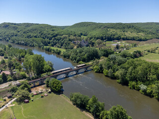 Fototapeta premium Aerial view on Dordogne river near Beynac-et-Cazenac village located in Dordogne department in southwestern France