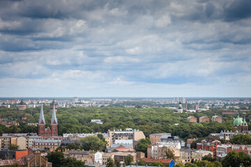 Fototapeta premium Aerial panorama of the center of riga, residential buildings and the old town of the city in background. Riga is the capital city of Latvia.