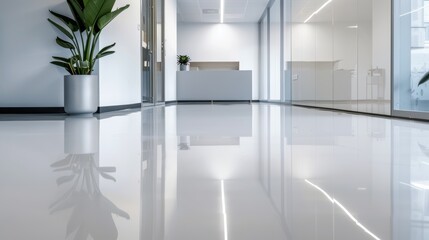 Modern industrial space featuring layered epoxy resin flooring, highlighting its durability and sleek appearance, reflective surface with subtle design