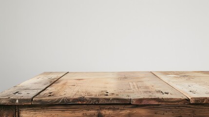 Wooden table on white backdrop for advertising idea