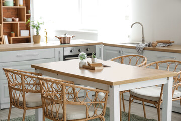 Dining table in interior of kitchen