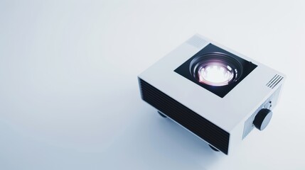 Obraz premium Modern projector is sitting on a white surface, its bright light hinting at the images it can project