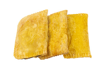 Three flaky Jamaican spicy beef, chicken or veggie patties isolated on white