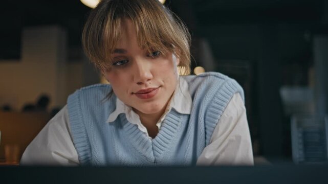 Businesswoman face looking laptop cabinet closeup. Busy woman staring computer