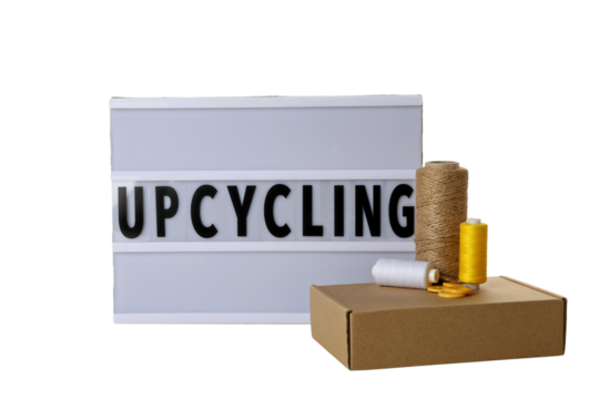 PNG, Light box with word Upcycling, paper box and threads, isolated on white background