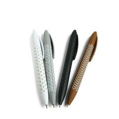 Many ballpoint pens on white background