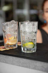 preparing a cocktail with ice and fruit  at the wedding