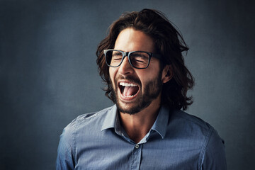 Fototapeta premium Scream, business and man in studio for frustration, company problem or bad news on gray background. Shouting, entrepreneur and corporate employee with anger for burnout, deadline or project mistake