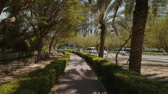 Discover Jumeirah Village Circle, featuring Five Hotel and Residences. This affordable, family-friendly Dubai area boasts lush greenery and walking areas under palms.