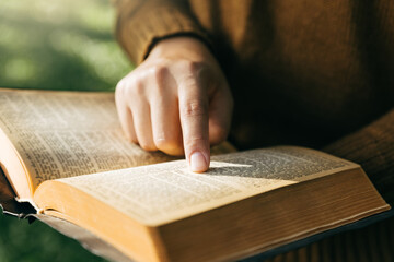 Young woman reading and study holy bible, Christianity, Concept of faith for god and teachings from...