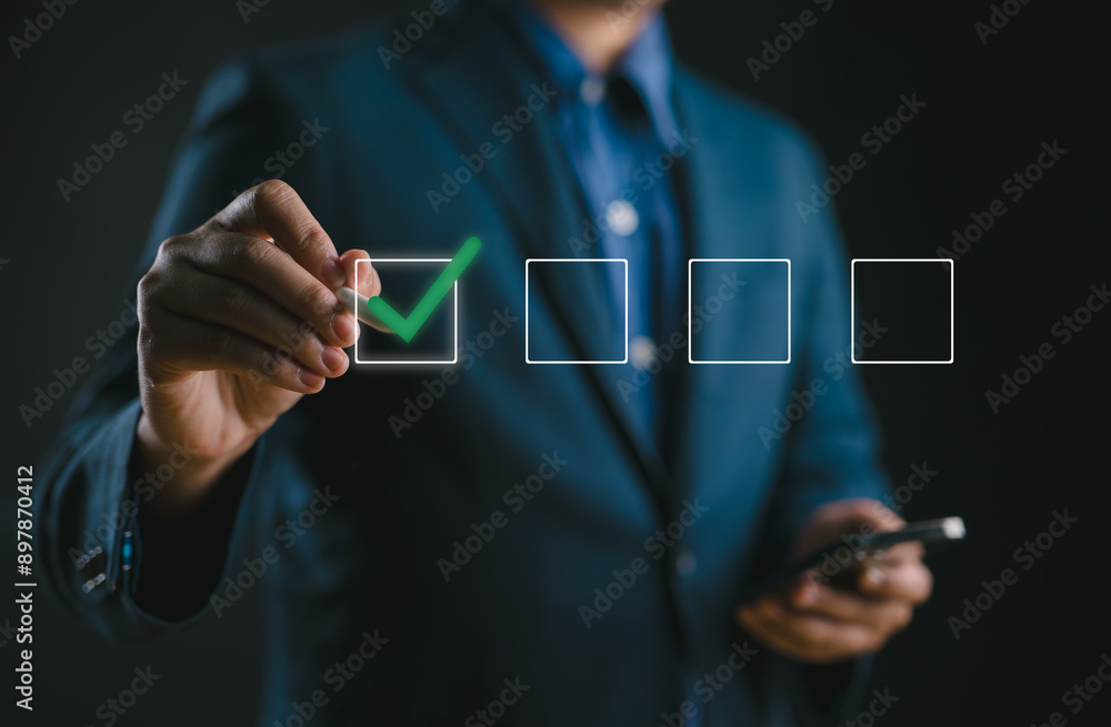 Fototapete Checklist Concept with Businessman and Check Mark. A businessman marking a check on a virtual checklist, representing task completion and organization in a professional business setting. filling out