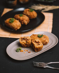 a plate of croquettes