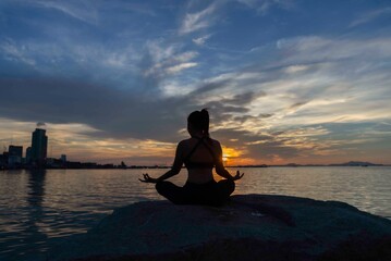 Fototapeta premium Lifestyle woman yoga exercise and pose for healthy life. Young girl or people pose balance body vital zen meditation for workout nature background