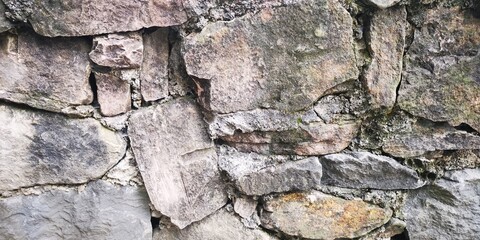 Obraz premium shapeless ancient brick wall.