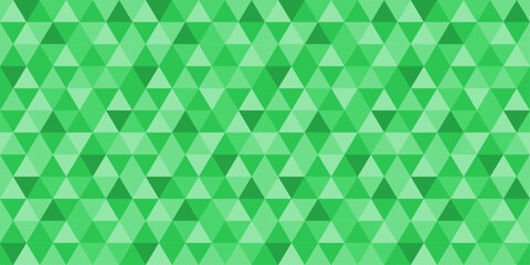 A green background with green triangles