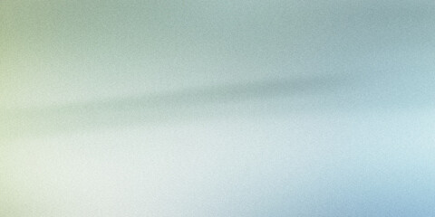 Obraz premium Subtle grainy texture on a light blue and green gradient background