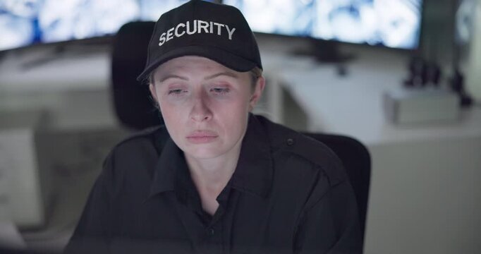 Woman, security guard and tired by computer with surveillance for job, protection and overworked. Female person, exhausted and burnout at work with fatigue, night shift and monitor in control room